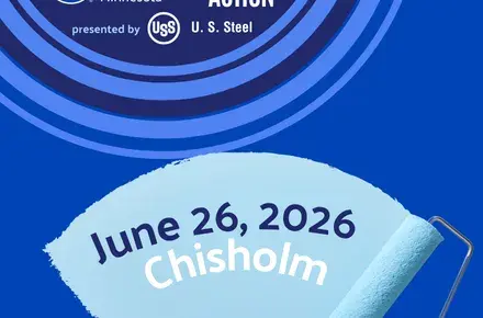 Blue Background. In dark blue circle text reads: UWNEMN Day of Action presented by U.S. Steel. In foreground, paint roller swipes with text: June 26, 2026, Chisholm