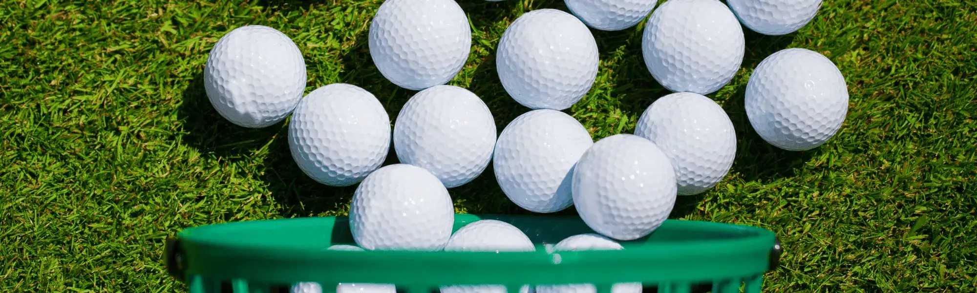 golf balls spill on to green