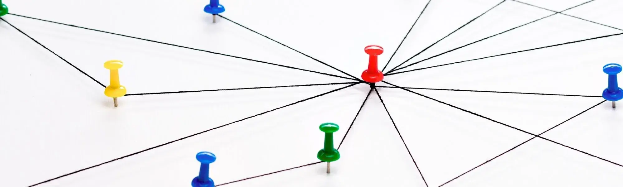 interconnected strings and pushpins