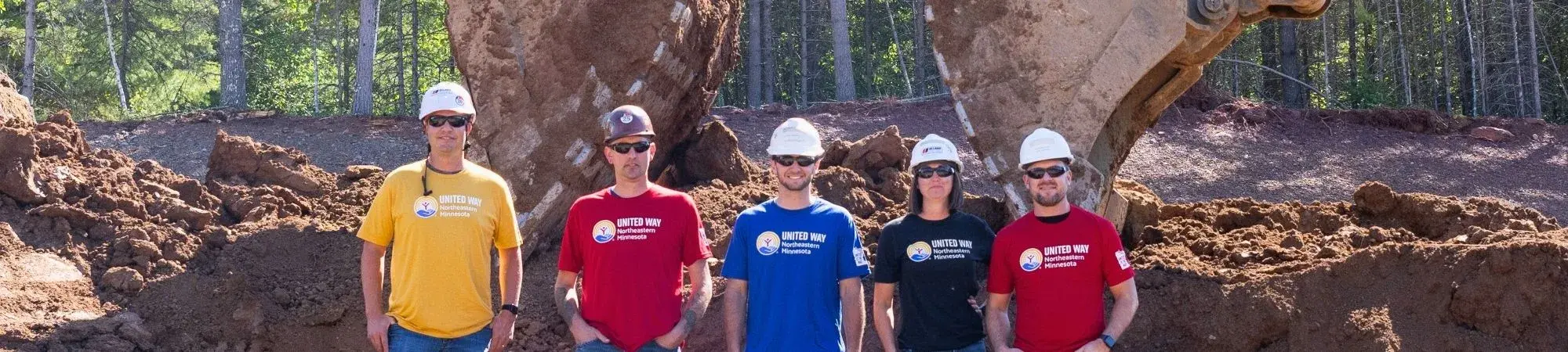 Ulland Brothers employees pose for a billboard photo
