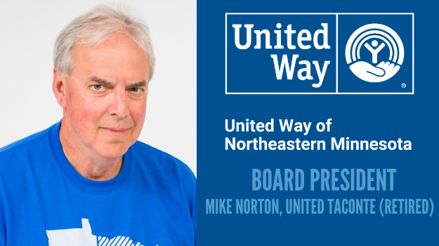 UWNEMN Board President Mike Norton is photographed in a blue Give Where You Live shirt
