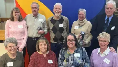 Buddy Backpacks volunteers receive UWNEMN Lifesaver Award at Annual Celebration